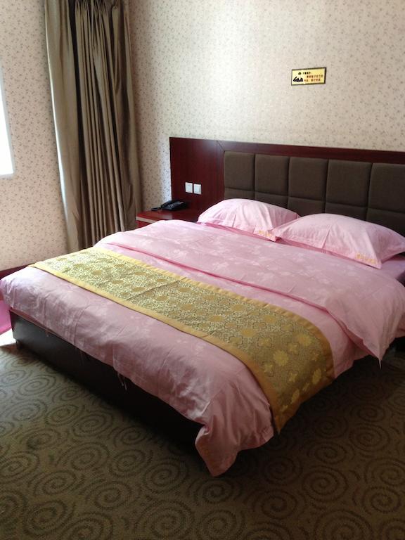 Jiuzhaigou Man Jiang Hong Hotel Room photo